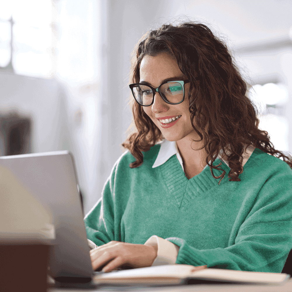 Woman at a laptop hiring candidates